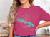 Pink t-shirt with Lake Red Rock Iowa map and compass rose design.