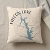 Pillow with blue Falcon Lake map graphic and compass rose design.