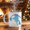 White mug with Yellowstone Lake, Wyoming map and compass design.