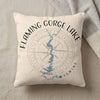 Cream pillow with Flaming Gorge Lake map, compass, and Wyoming text.