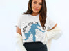 White t-shirt with blue graphic of Lake Dillon, Colorado, and compass.