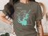 Olive green t-shirt with "Lake Jocassee South Carolina" in turquoise map outline.