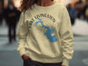 Cream sweatshirt with Lake Livingston Texas map and compass design