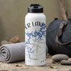White water bottle with "ER LAKE" text and a blue lake map compass design.