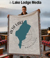 Woven blanket showing the shape of Alta Lake, Washington with a compass rose design.