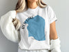 White t-shirt with blue shape displaying "RED LAKE MINNESOTA".