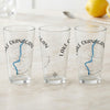 Three clear glasses featuring "Lake Okanagan British Columbia" text and a compass rose design.