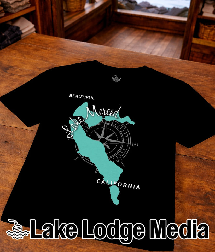 Black t-shirt with teal map of Lake Merced, California and "Lake Lodge Media" logo.