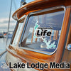 Highlands Life sticker on a boat window, with Lake Lodge Media logo below.