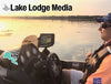 Man in boat with fishing sonar and "Lake Lodge Media" overlay.