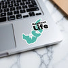 Sticker with teal map outline and "Reelfoot Life" text on laptop
