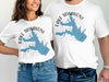 White t-shirts feature "Lake Tawakoni Texas" with a blue lake outline and compass.
