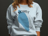 Light blue sweatshirt with "LAKE MOHAVE NEVADA" text and blue lake graphic.