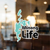 Turquoise lake shape sticker with "Minong Life" text on glass.
