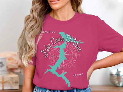 Lake Coeur d'Alene, Idaho map and compass graphic on a magenta t-shirt.