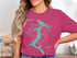 Lake Coeur d'Alene, Idaho map and compass graphic on a magenta t-shirt.