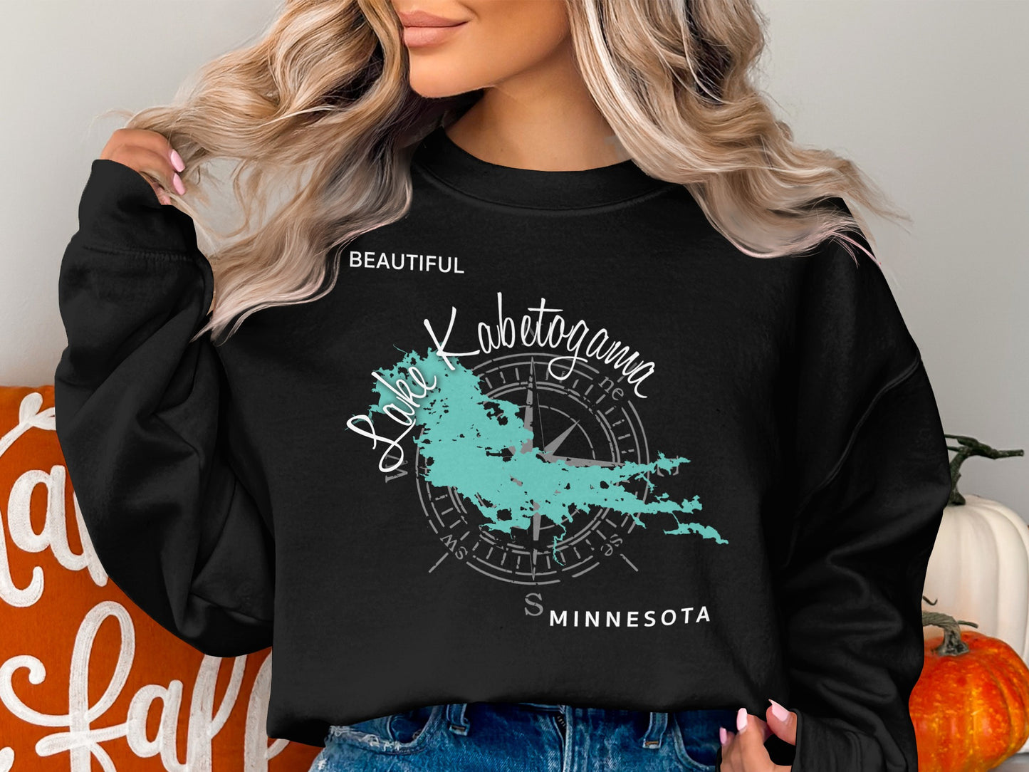 Black sweatshirt with Lake Kabekona map and compass graphic.