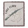 Woven blanket with Lake Clark map, compass, and "Alaska" text.
