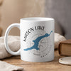 White mug with Mason Lake Washington map and compass graphic, steaming.