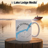 White mug with "Lake Ullswater England" and compass design.