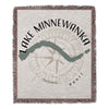 Throw blanket with Lake Minnewanka map design and compass rose.