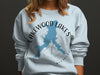 Light blue sweatshirt with "Lakewood Lakes Missouri" and a map outline on compass rose.