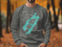 Crewneck sweatshirt featuring a teal map of Lake Placid, New York with compass rose.