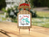 Sled ornament with "Merry Christmas FROM Canyon Lake" text and a lake silhouette.