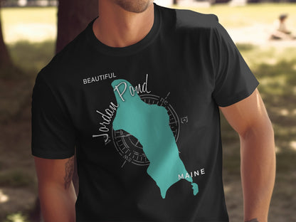 Black t-shirt featuring a teal map of Jordan Pond, Maine with compass rose.