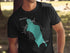 Black t-shirt featuring a teal map of Jordan Pond, Maine with compass rose.