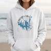 White hoodie with Carters Lake Georgia map and compass graphic.