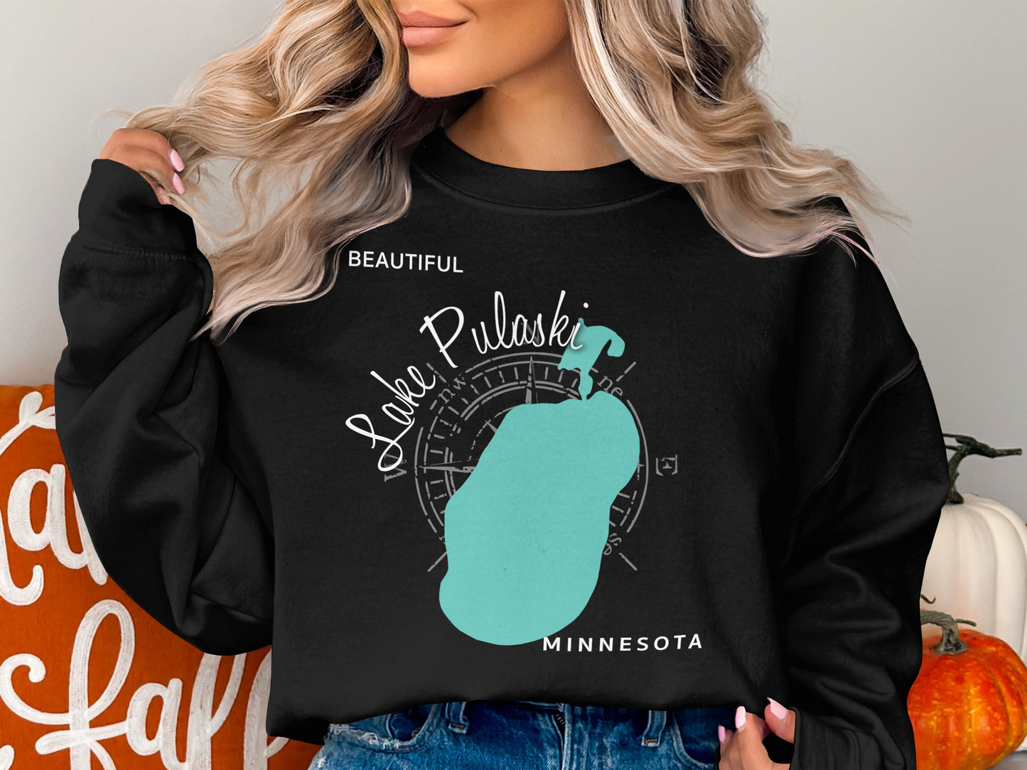 Black sweatshirt with teal Lake Pulaski, Minnesota map and compass design.