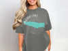 Gray t-shirt with "Oneida Lake New York" text and a teal lake outline over a compass.