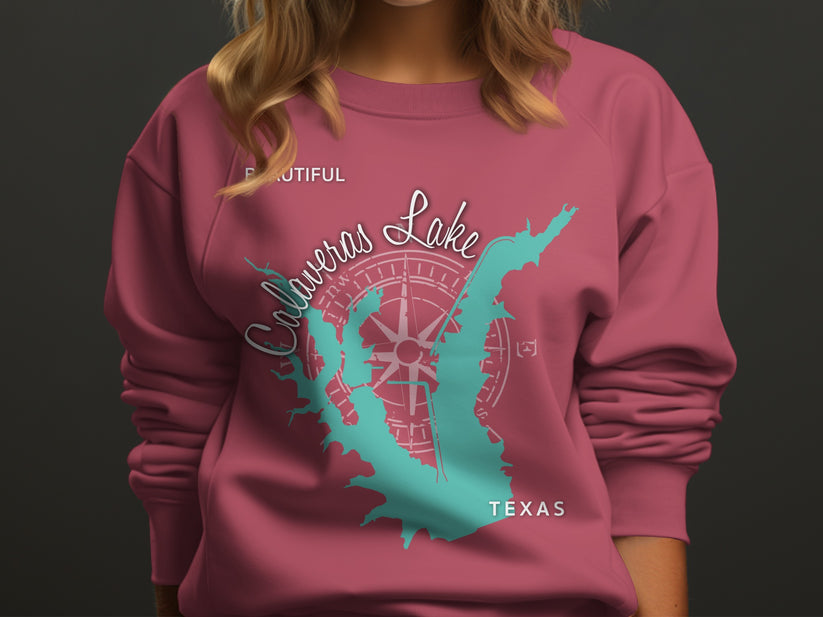 Pink sweatshirt with "Calaveras Lake Texas" and compass rose graphic.