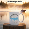 Mug with Rangeley Lake map and compass design on a foggy lake background.