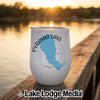 White stainless steel wine tumbler with a blue map of Pyramid Lake resting on a wooden dock.