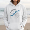 White hoodie with compass and Prior Lake Minnesota map graphic on chest.
