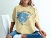Yellow t-shirt with Big Sandy Lake, Minnesota graphic and compass rose.