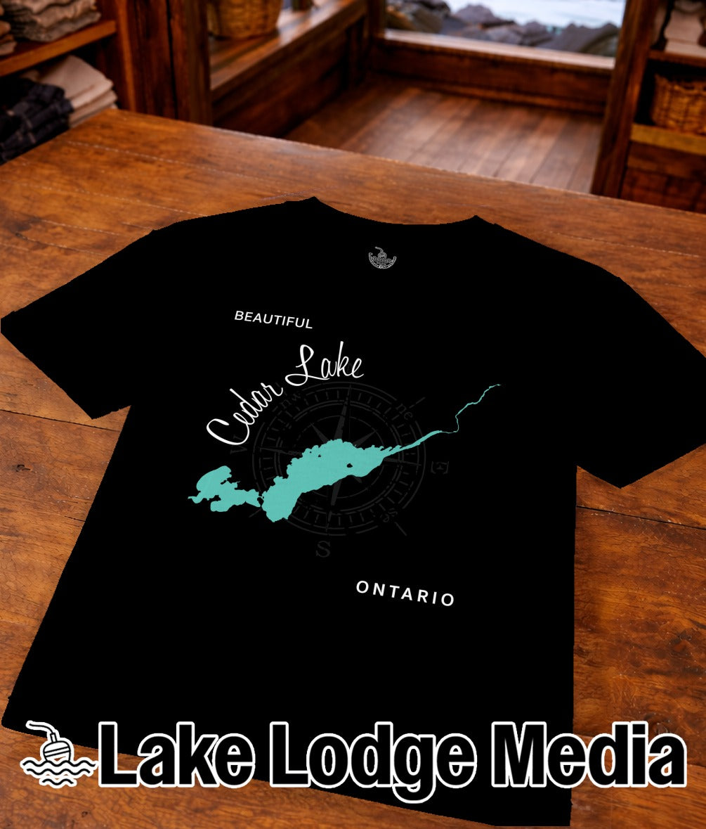 Black t-shirt with "Beautiful Cedar Lake Ontario" map graphic and "Lake Lodge Media" logo.