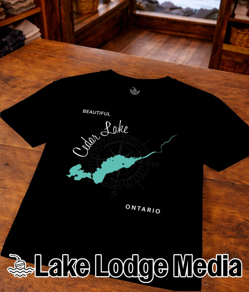 Black t-shirt with "Beautiful Cedar Lake Ontario" map graphic and "Lake Lodge Media" logo.