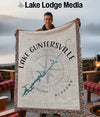 Woven throw blanket featuring a map of Lake Guntersville, Alabama with a compass rose.