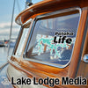 "Patoka Life" graphic with a teal lake outline above "Lake Lodge Media" text on a boat.