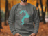 Sweatshirt featuring "Beautiful Lake Pend Oreille Idaho" and a compass rose graphic.