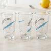 Three clear glasses featuring a compass rose design and blue Alaska map graphic.