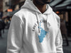 White hoodie with blue Lake Buchanan, Texas map and compass design.