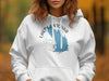 White hoodie with a blue map of Lake Canton in Oklahoma and a compass rose graphic.