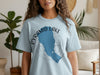 Light blue t-shirt with blue Pyramid Lake shape and "NEVADA" text.