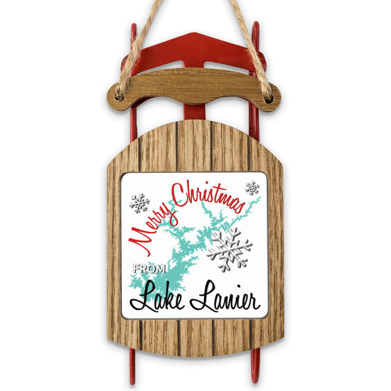 Wooden sled ornament with "Merry Christmas from Lake Lanier" and snowflake.