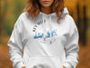 White hoodie with Key West, Florida graphic featuring a compass and map outline.