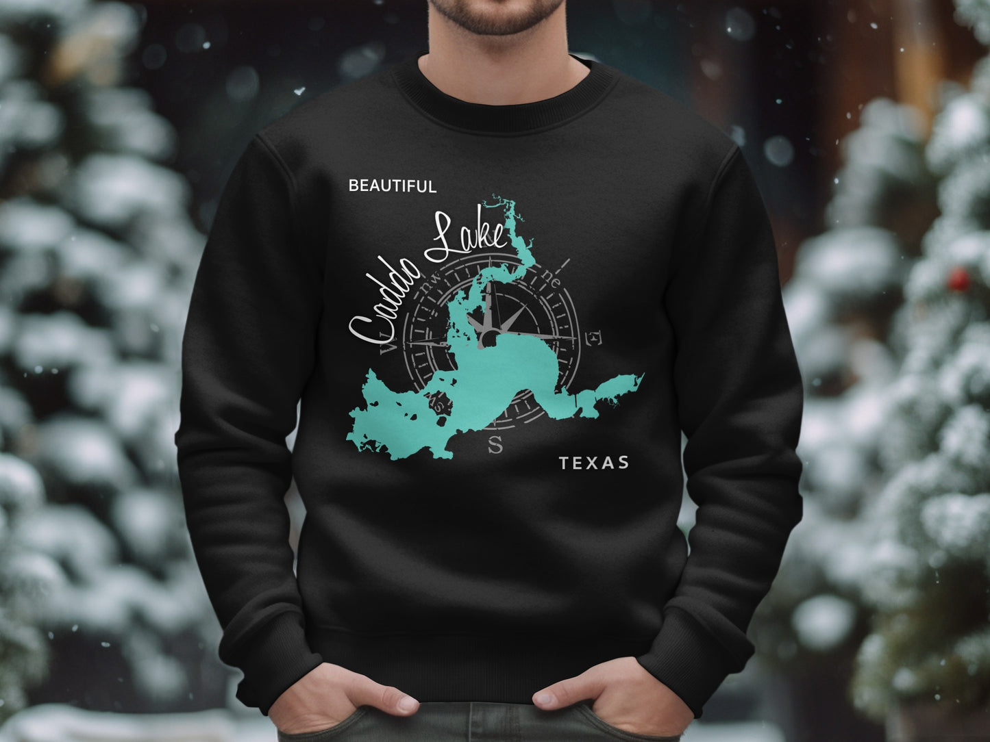 Black crewneck sweatshirt with a teal Caddo Lake map and compass design.